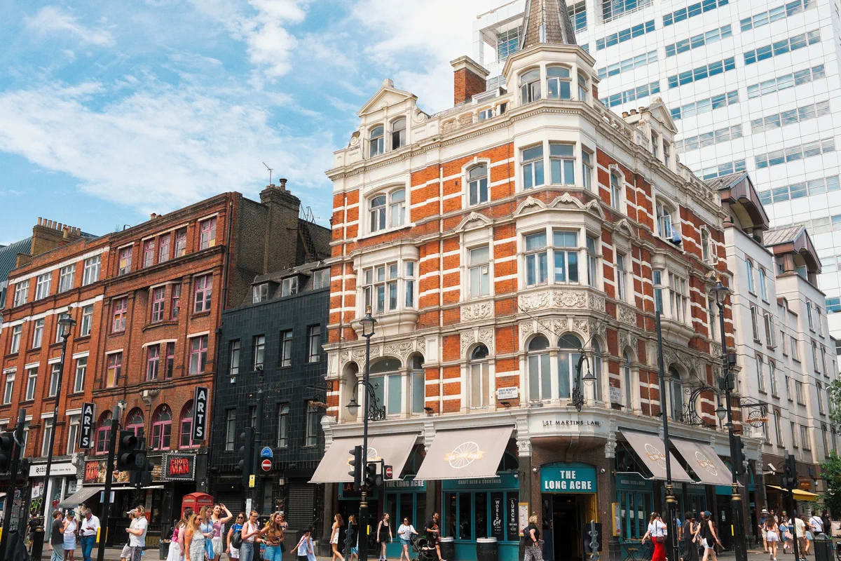 Red brick and white stone at the corner of Long Acre and St Martin's Lane in Covent Garden.